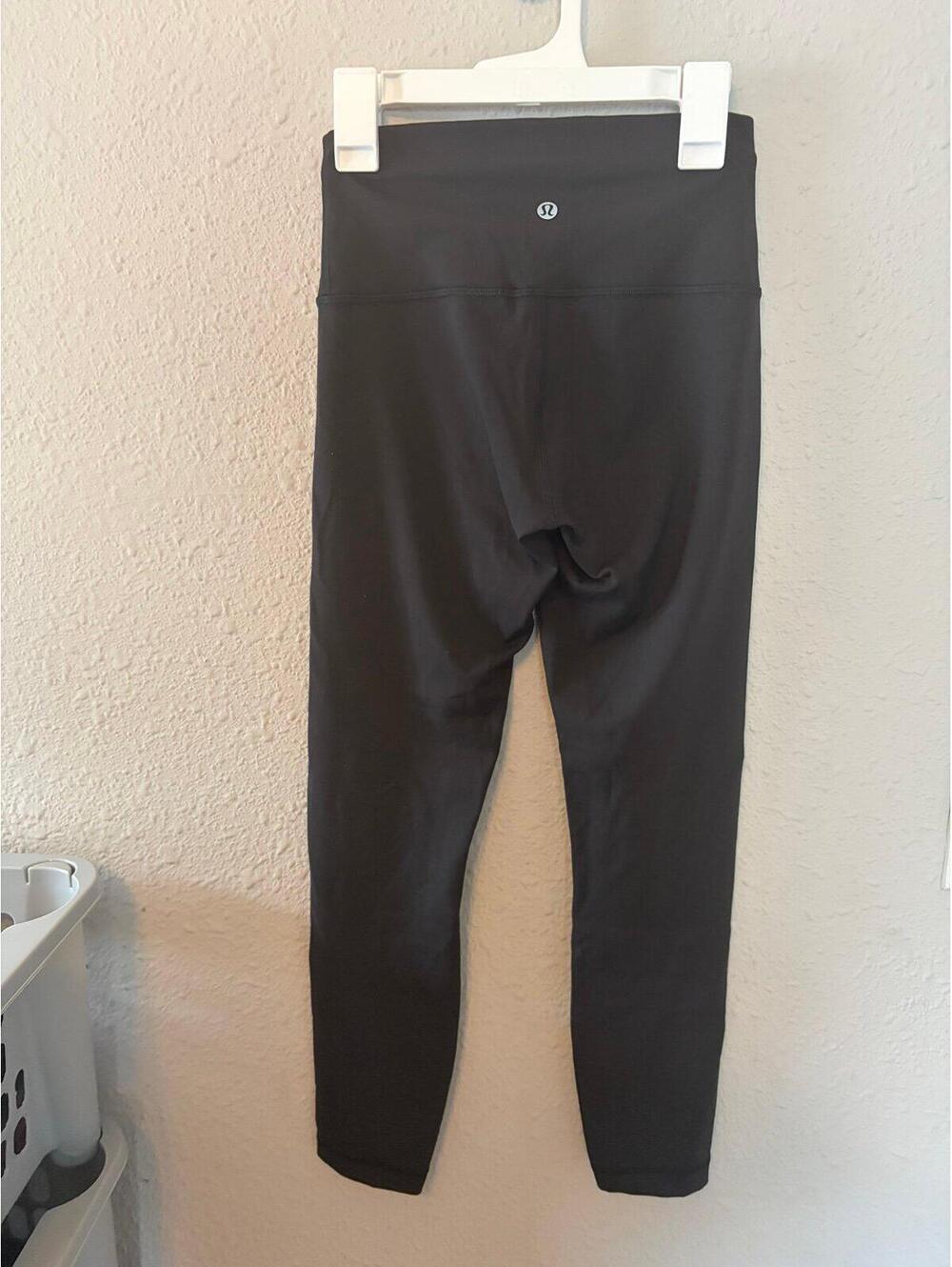 Lululemon Wunder Train High-Rise Tight 25in inseam Black size 4. Like new condit